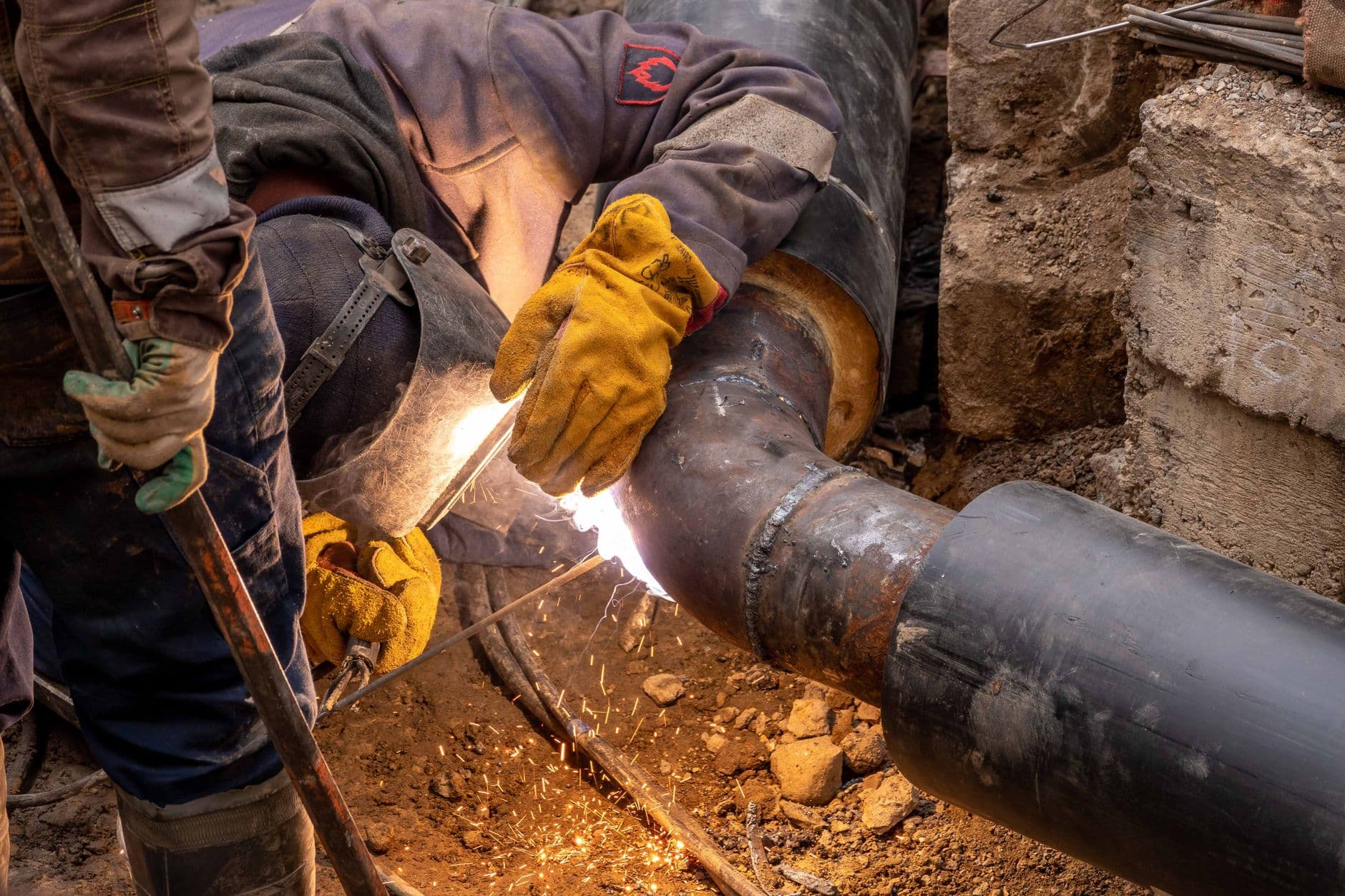 tunnel construction worker pipework